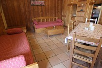 Chalet 6 Les Balcons - 3-kamer apt. voor max. 6 pers. | BAL630B - woonkamer met eettafel en zitbanken